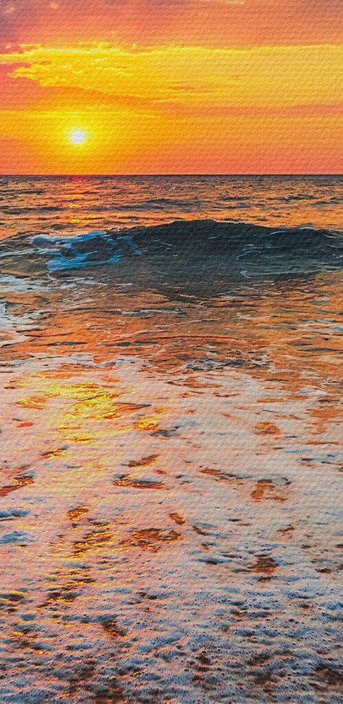 A sunset over a beach A sunset over a beach