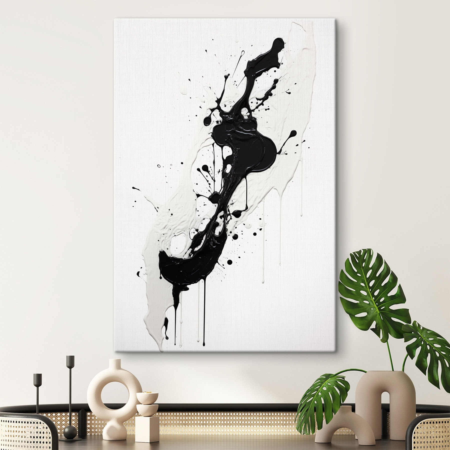 Black and white paint splattered on a white surface Black and white paint splattered on a white surface