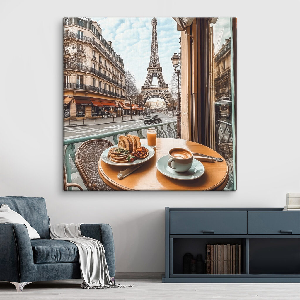 Table with a plate of food and a cup of coffee on it