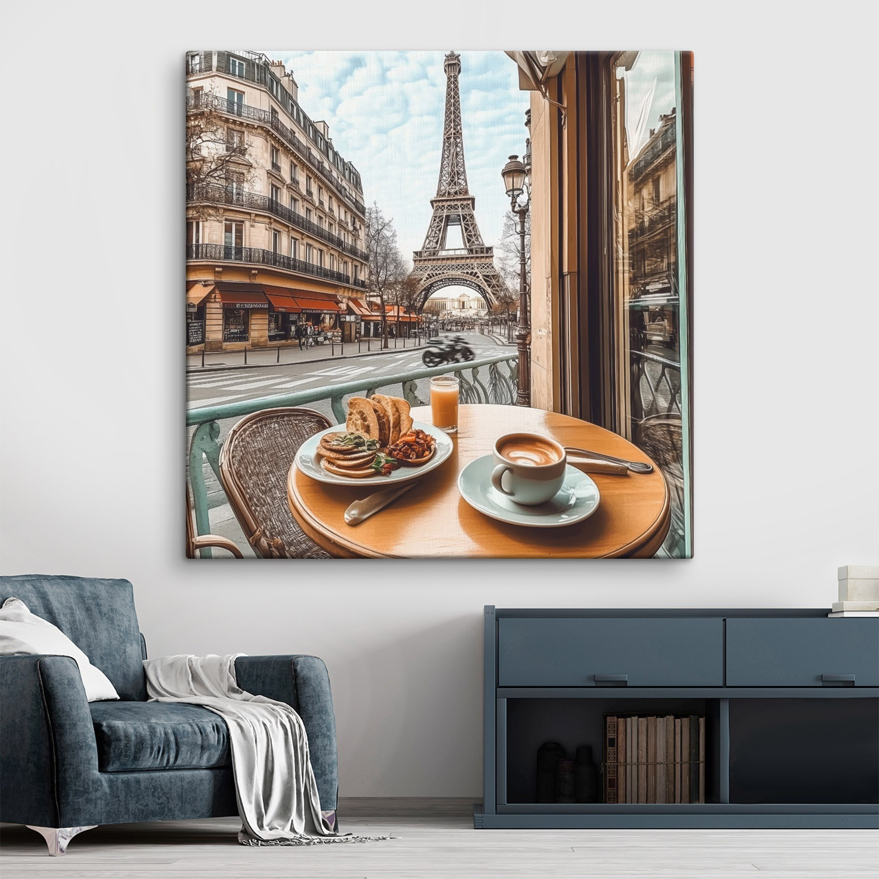 Table with a plate of food and a cup of coffee on it