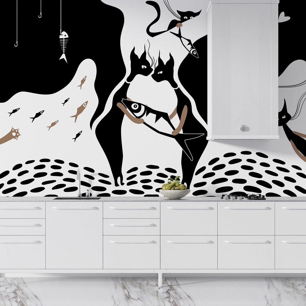 Černobílá kočka s rybami a rybičkami