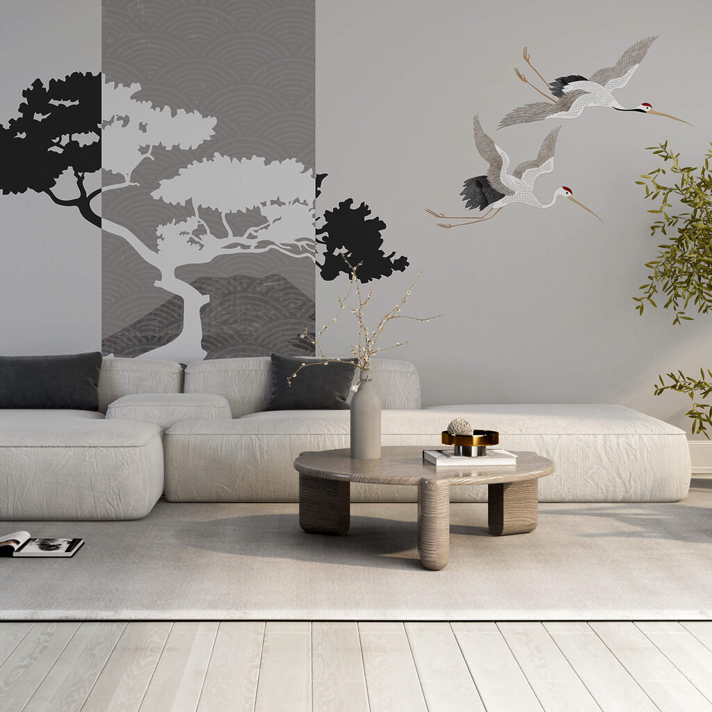 Pár jeřábů letících vedle stromu Pár jeřábů letících vedle stromu