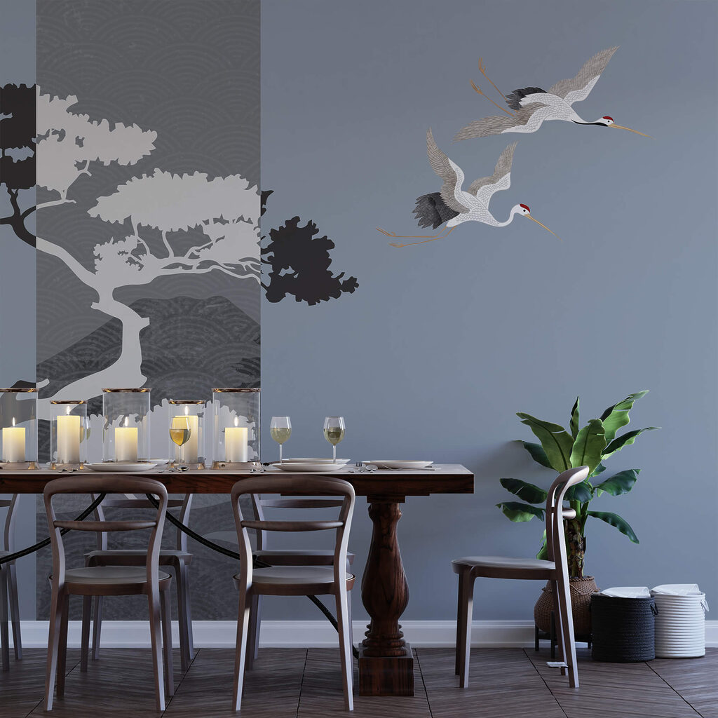 Pár jeřábů letících vedle stromu Pár jeřábů letících vedle stromu