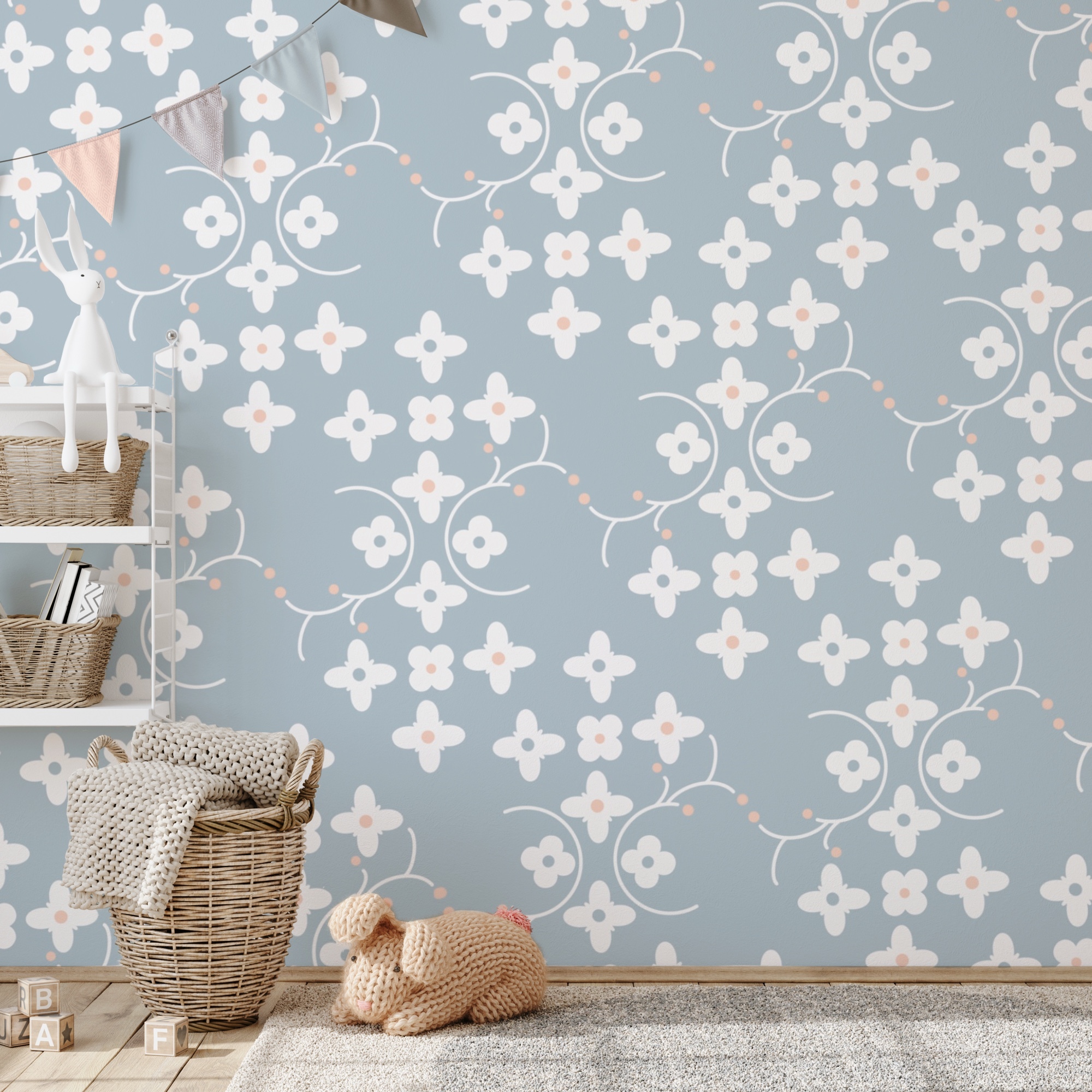 Vzor bílých květů a růžových teček na modrém pozadí