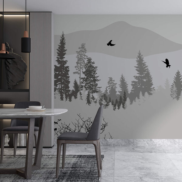 Ptáci letící nad zasněženou horou