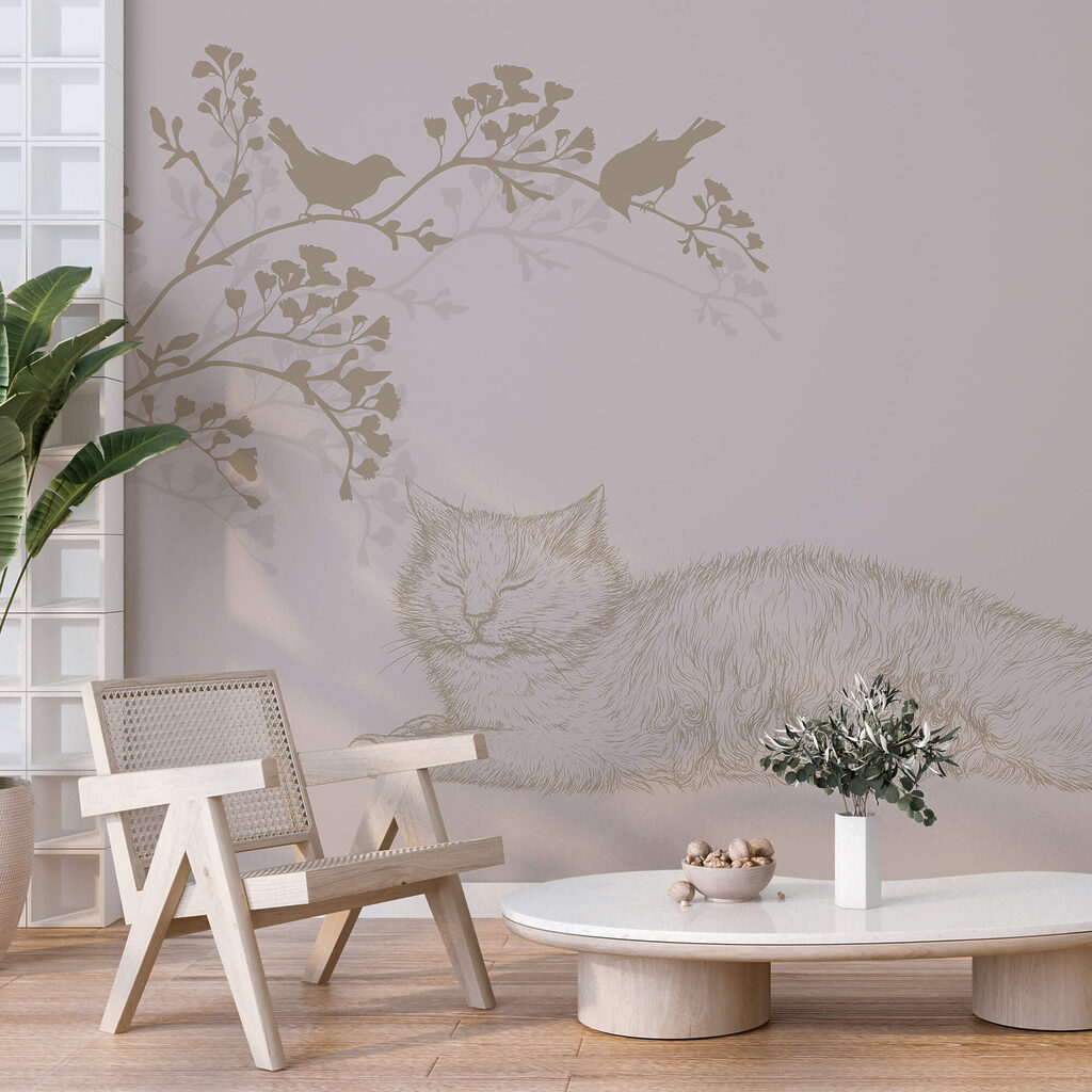 Kočka ležící na větvi stromu