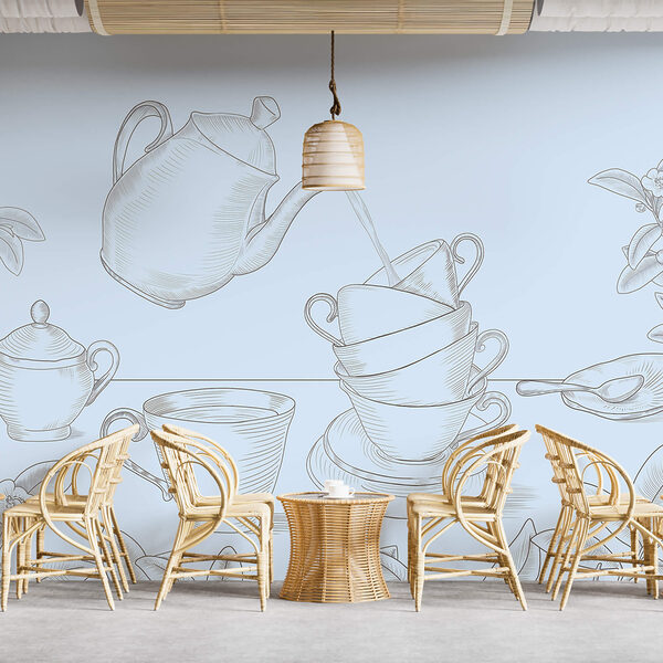 Čajová konvice nalévá čaj do hromádky čajových šálků