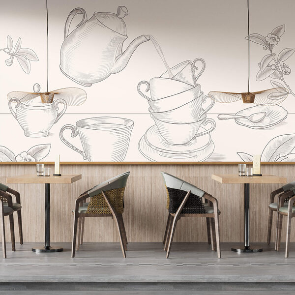 Čajová konvice nalévá čaj do hromádky čajových šálků