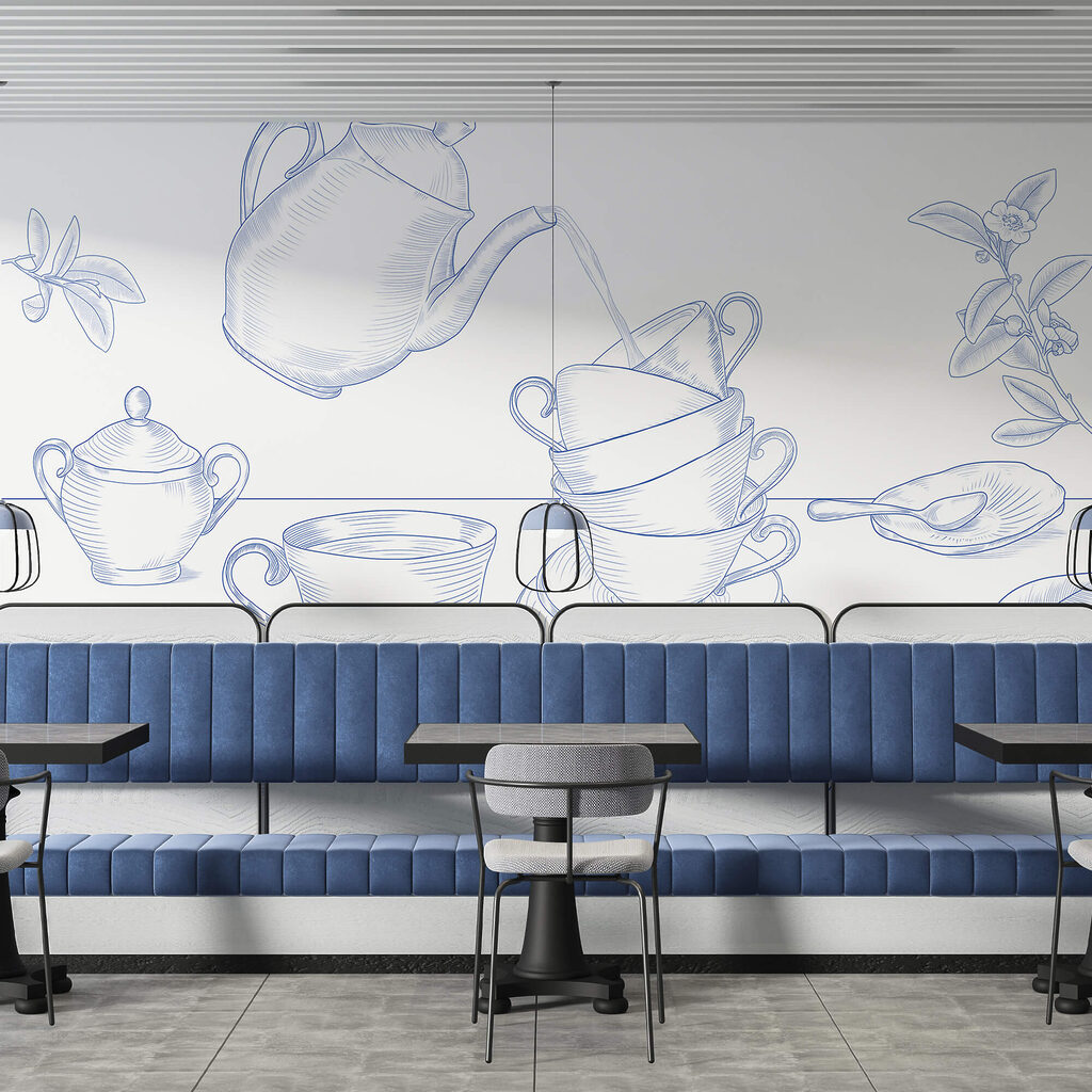 Čajová konvice nalévá čaj do hromádky čajových šálků