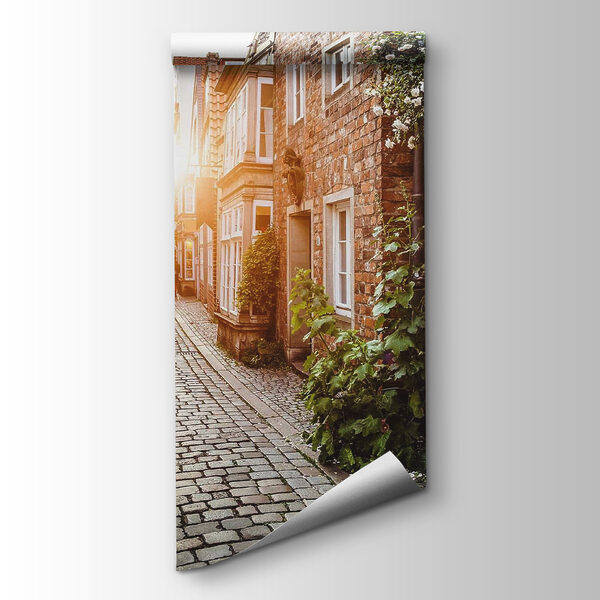 Street with buildings and tables and chairs Street with buildings and tables and chairs