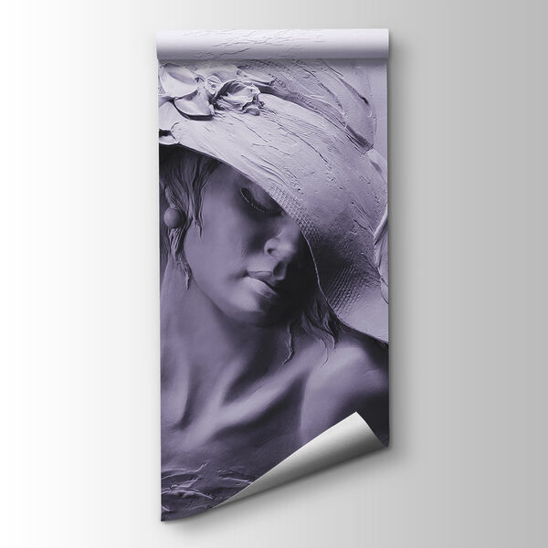 A sculpture of a woman in a hat