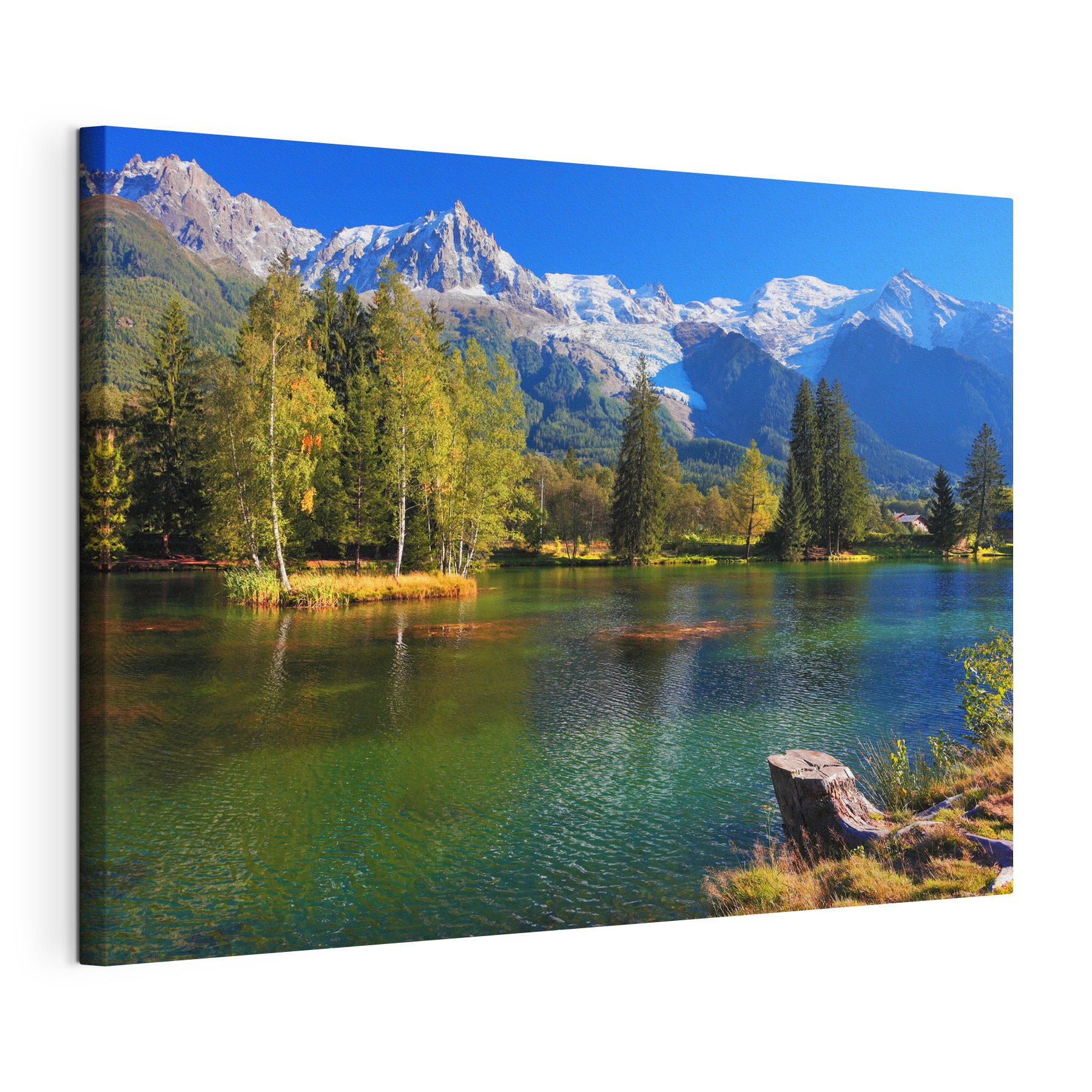 A lake surrounded by trees and mountains