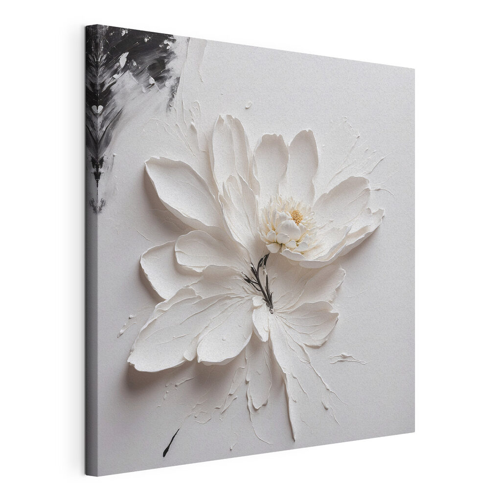 A white flower with black paint