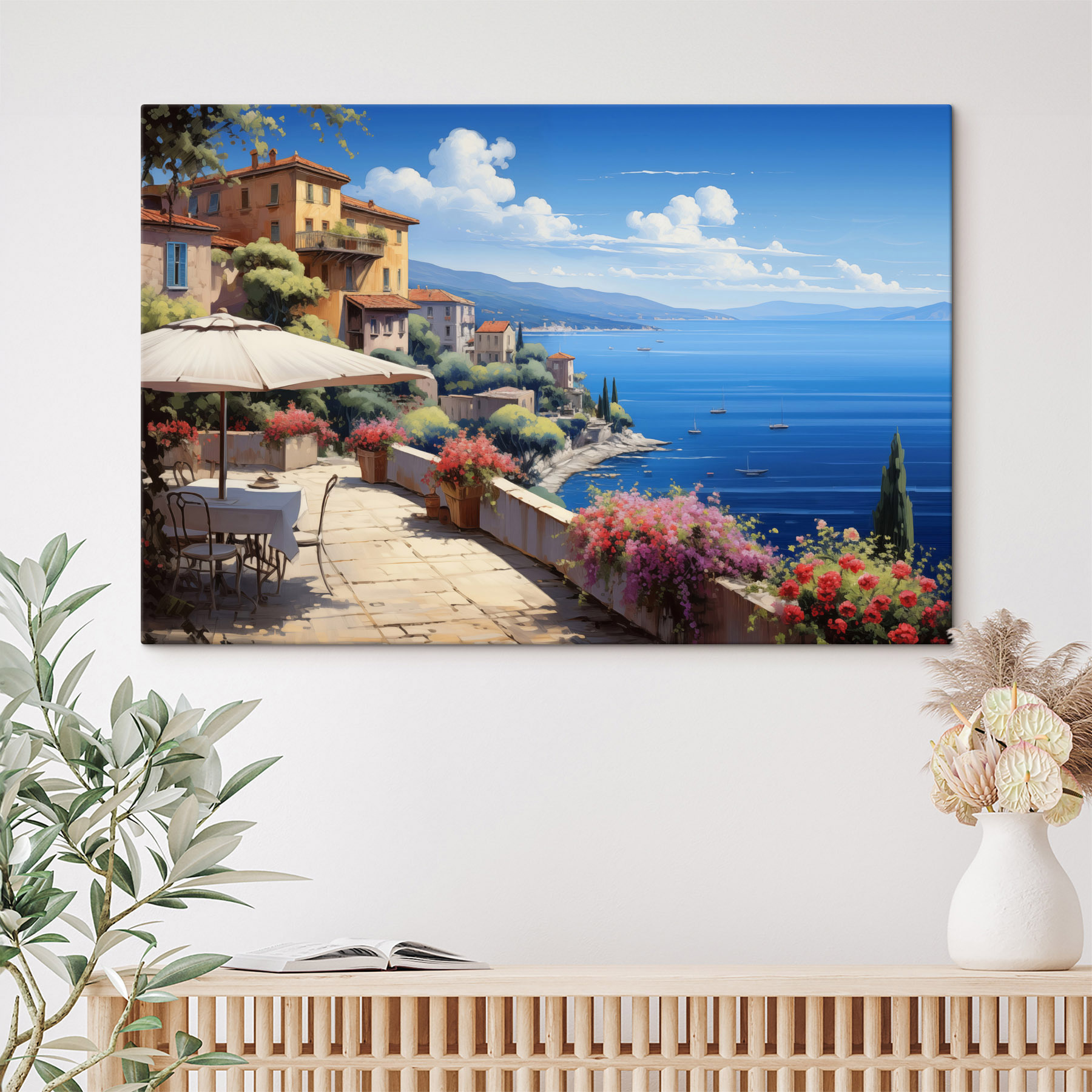 View of a town and the ocean from a balcony