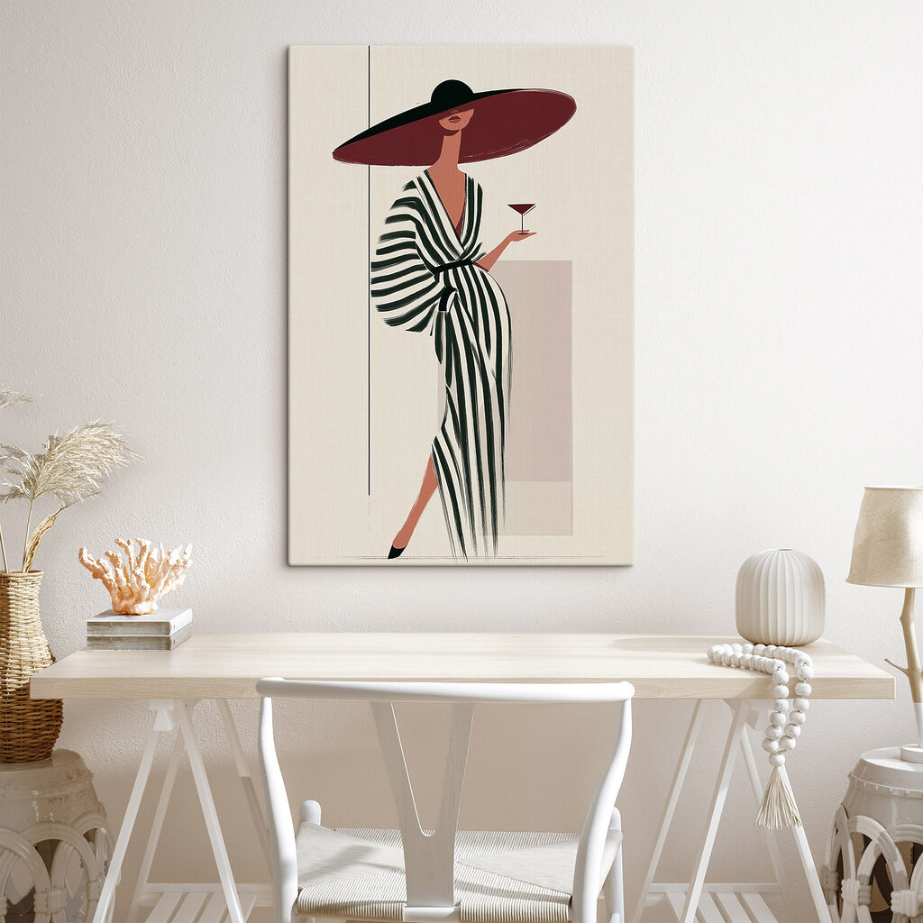 Woman in a striped dress holding a glass of wine Woman in a striped dress holding a glass of wine