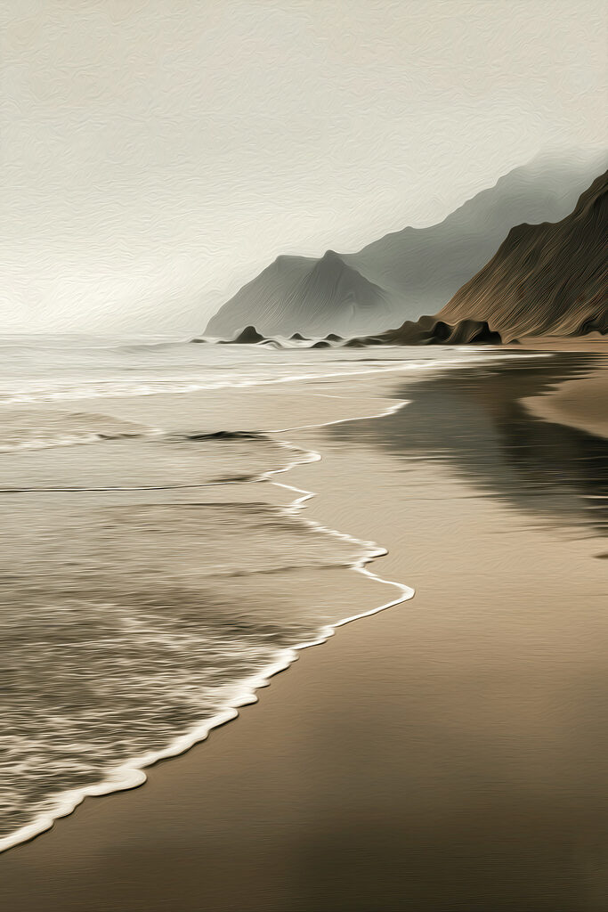 Beach with waves and mountains