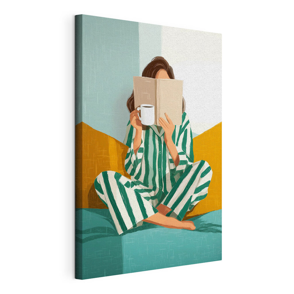 Woman sitting on a bed with a book and a mug Woman sitting on a bed with a book and a mug