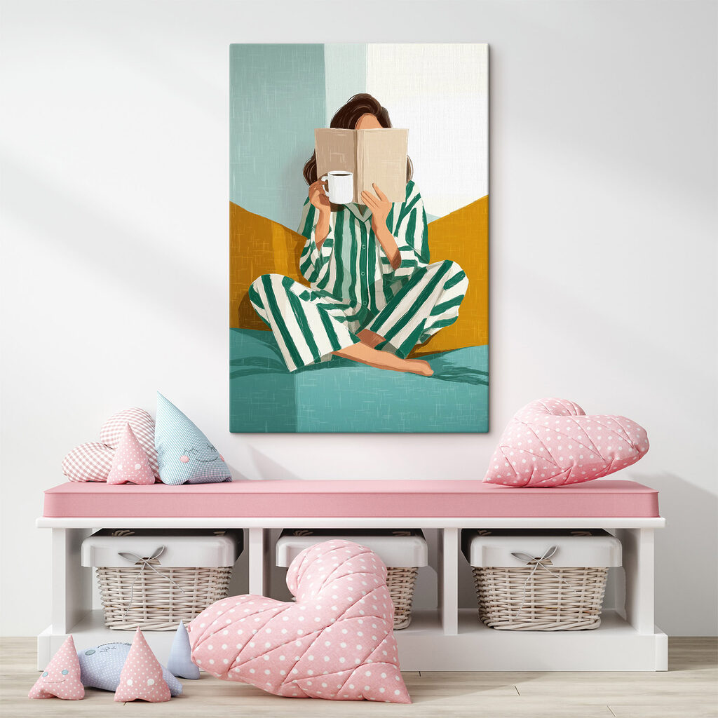 Woman sitting on a bed with a book and a mug Woman sitting on a bed with a book and a mug