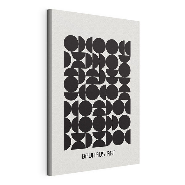 A black and white pattern of circles and half circles A black and white pattern of circles and half circles