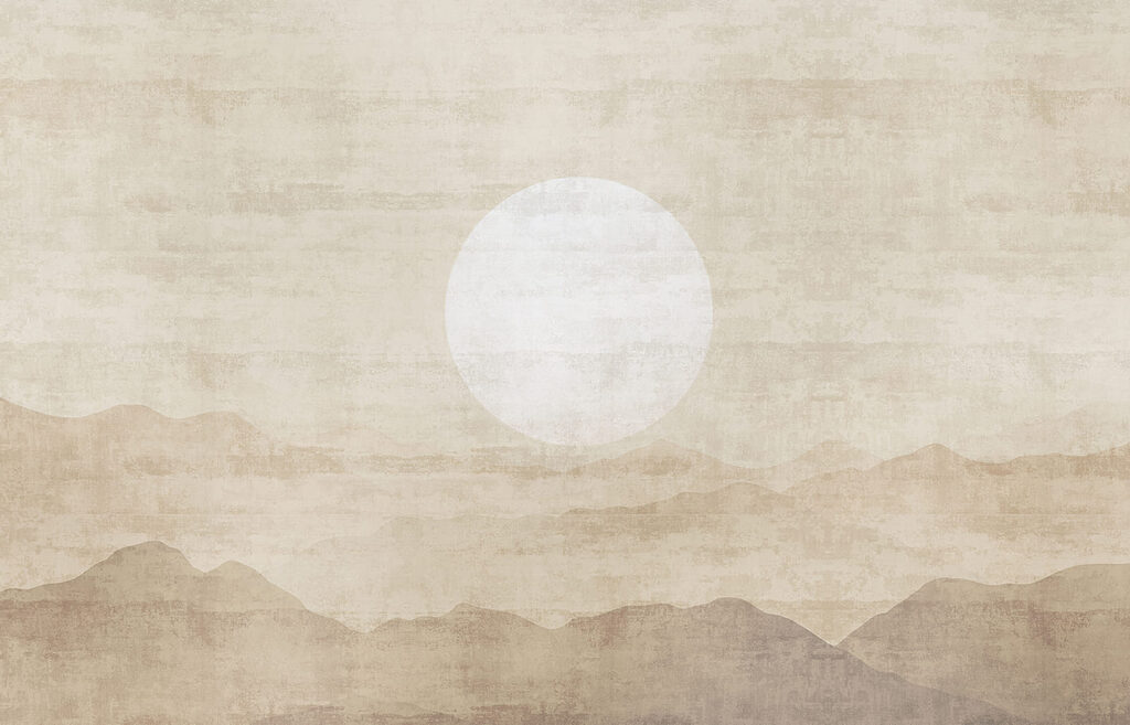 Sun over a mountain range