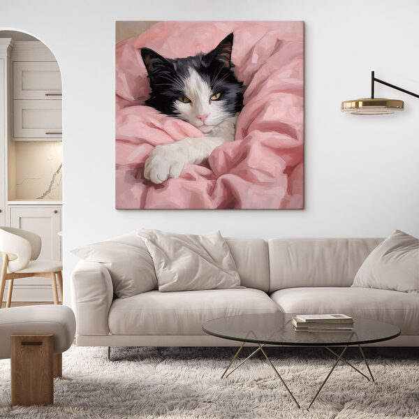 Cat lying in a blanket