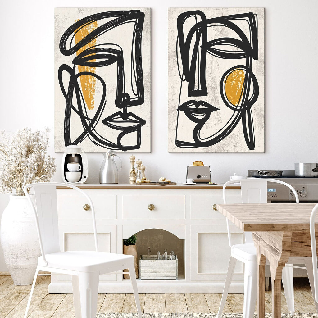 Couple of faces drawn in black and yellow