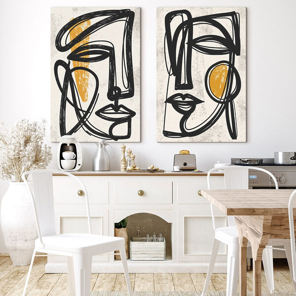 Couple of faces drawn in black and yellow